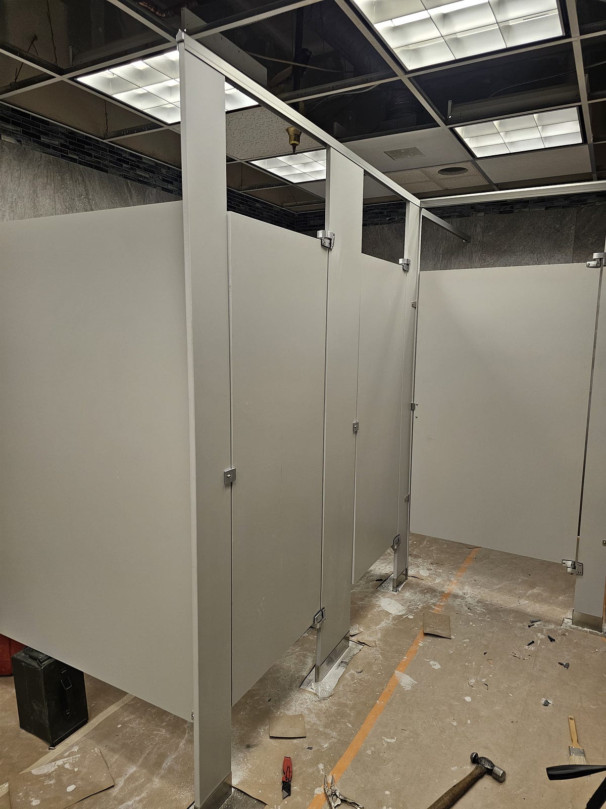 Phenolic bathroom partitions in an upscale commercial restroom